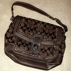 Chocolate brown turnlock COACH purse